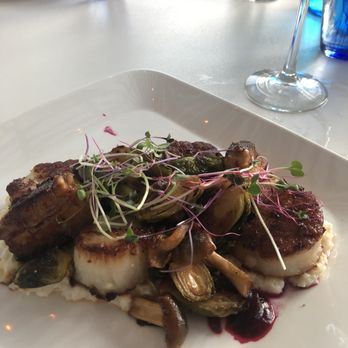 Ocean Hai - Seared scallops with pork belly over grits with shataki mushrooms and roasted brussel sprouts - New American Near Me - Clearwater Beach, Florida