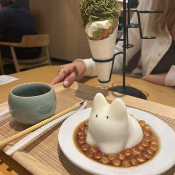 Tendon Kohaku - coconut bouncing cat pudding, vanilla/matcha swirl soft cream cone - Japanese Near Me - Bellevue, Washington Tendon Kohaku - coconut bouncing cat pudding, vanilla/matcha swirl soft cream cone - Japanese Near Me - Bellevue, Washington