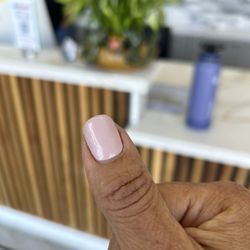 NT Nail Spa - Nails were very wavy due to filing underneath. Lots of bubbles.