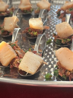 Seafood Catering Specialties - $1000 Minimum for Catering & Personal Chef Services. 2 Chefs Catering has been owned & operated by Ryan & Tricia Peterson since 2009. Both attended Le Cordon Bleu in Scottsdale, AZ, where they earned associate degrees in culinary arts. Originally from Hoyt & Mayetta, KS, Ryan & Tricia understand what local clients expect from a quality catering experience & consistently strive to exceed those expectations. They cater events of all sizes & pride themselves on a personalized approach, ensuring each event is special & tailored to the client’s needs. 2 Chefs Catering serves Topeka & the surrounding areas. Head Chef Ryan graduated from culinary school in 2009. His experience includes working at several restaurants in Topeka, KS, & Phoenix, AZ, such as serving as kitchen manager at Blind Tiger Brewery & Top of the Tower, & spending over five years with Aboud’s Catering. In Arizona, Ryan worked at Michael’s Catering & Olives & Ivy. He is passionate about cooking for both friends & clients. Tricia, who also attended culinary school, specializes in baking. She enjoys creating specialty desserts—including crème brûlée, scones, & other confections—for the Millennium Cafe. In addition to her role as baker & front-of-house manager, she manages the website, social media accounts, & administrative tasks for both the Cafe & the catering business. Tricia holds a degree from Washburn University & enjoys writing, reading, & blogging in her free time. Seafood Catering Specialties - $1000 Minimum for Catering & Personal Chef Services. 2 Chefs Catering has been owned & operated by Ryan & Tricia Peterson since 2009. Both attended Le Cordon Bleu in Scottsdale, AZ, where they earned associate degrees in culinary arts. Originally from Hoyt & Mayetta, KS, Ryan & Tricia understand what local clients expect from a quality catering experience & consistently strive to exceed those expectations. They cater events of all sizes & pride themselves on a personalized approach, ensuring each event is special & tailored to the client’s needs. 2 Chefs Catering serves Topeka & the surrounding areas. Head Chef Ryan graduated from culinary school in 2009. His experience includes working at several restaurants in Topeka, KS, & Phoenix, AZ, such as serving as kitchen manager at Blind Tiger Brewery & Top of the Tower, & spending over five years with Aboud’s Catering. In Arizona, Ryan worked at Michael’s Catering & Olives & Ivy. He is passionate about cooking for both friends & clients. Tricia, who also attended culinary school, specializes in baking. She enjoys creating specialty desserts—including crème brûlée, scones, & other confections—for the Millennium Cafe. In addition to her role as baker & front-of-house manager, she manages the website, social media accounts, & administrative tasks for both the Cafe & the catering business. Tricia holds a degree from Washburn University & enjoys writing, reading, & blogging in her free time.