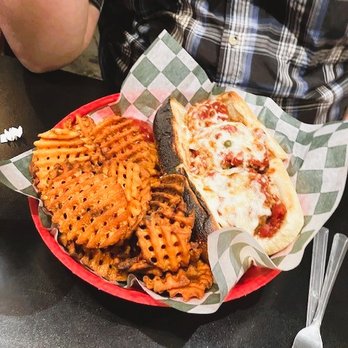 Stoked Woodfired Pub - Meatball Parm sub with sweet potato waffle fries - Pizza Near Me - Winston-Salem, North Carolina