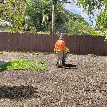 Nyce Lawn Services - a man in an orange shirt standing in front of a shed - Lawn Services Near Me - Princeton, Florida Nyce Lawn Services - a man in an orange shirt standing in front of a shed - Lawn Services Near Me - Princeton, Florida