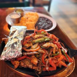 El Guajillo Mexican - Steak Asada with rice and re-fried beans.
