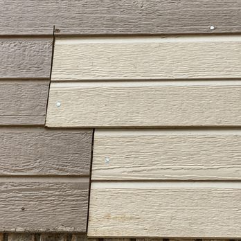 Baker Construction & Remodeling - Siding that was not replaced per the contract. Also the worker cut into the good Masonite. Not caulked or painted. - General Contractors Near Me