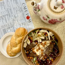 Cafe POM - Choreg- Armenian brioche roll,  Warm bowl with black lentils, greens , topped with luleh kabobs- Armenian ground beef kabobs , tourshi-