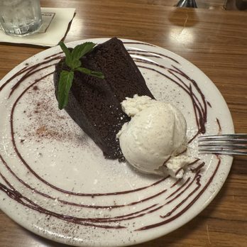 The Hitching Post 2 - Old fashioned chocolate cake with vanilla ice cream. - Steakhouses Near Me - Buellton, California The Hitching Post 2 - Old fashioned chocolate cake with vanilla ice cream. - Steakhouses Near Me - Buellton, California
