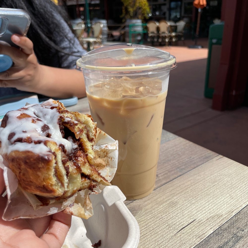 Coffeeville - Large iced  Marshmallow butterscotch vanilla latte with oatmilk and cinnamon roll! Delicious. Not too sweet. Just right - Coffee & Tea Near Me - Watsonville, California