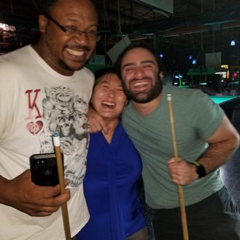 Shamrock - three men and a woman posing for a picture - Pubs Near Me - New Orleans, Louisiana Shamrock - three men and a woman posing for a picture - Pubs Near Me - New Orleans, Louisiana