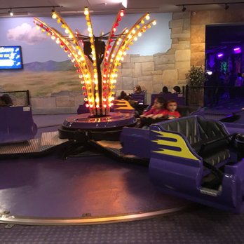 Enchanted Castle - "The catapult" which is a small ride for kids that basically spins them in circles. - Amusement Parks Near Me - Lombard, Illinois Enchanted Castle - "The catapult" which is a small ride for kids that basically spins them in circles. - Amusement Parks Near Me - Lombard, Illinois