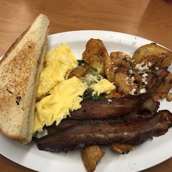OWL - Eggs any style with cilantro potatoes, wheat toast, and habanero bacon - Mexican Near Me - Royal Oak, Michigan OWL - Eggs any style with cilantro potatoes, wheat toast, and habanero bacon - Mexican Near Me - Royal Oak, Michigan