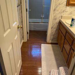 Before the remodel. Had wood floor that was starting to show water damage. Also had wallpaper that we never were thrilled about