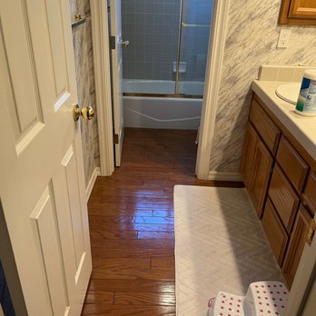JVT Construction - Before the remodel. Had wood floor that was starting to show water damage. Also had wallpaper that we never were thrilled about - General Contractors Near Me - Fair Oaks, California
