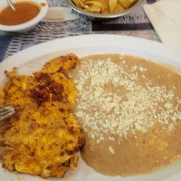 Chorizo con huevo frijoles and a cup of coffee. Chorizo con huevo frijoles and a cup of coffee.