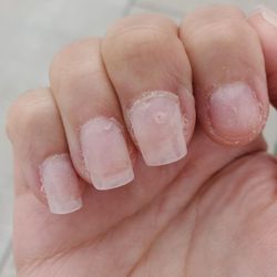 iNails And Spa - Nails not cured or placed right. This is why I chose not to continue the nails.