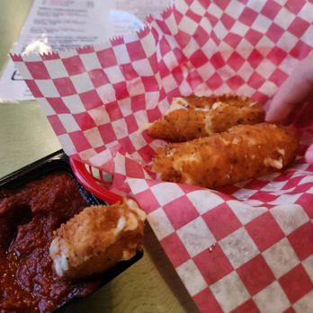 Doghouse Pizza - Mozzarella sticks that my family couldn't keep there hands off of, LOL. - Pizza Near Me - Melbourne, Florida