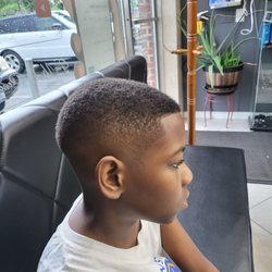 Alvaro’s BarberShop - Fantastic barbers for young boys.  They have great prices a d styles.  Very happy with this place of business.