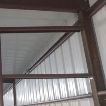 JRM Construction - Proof of the lack of support on the inside corners.  Walls to roof. No crossmember from main columns. - Metal Fabricators Near Me