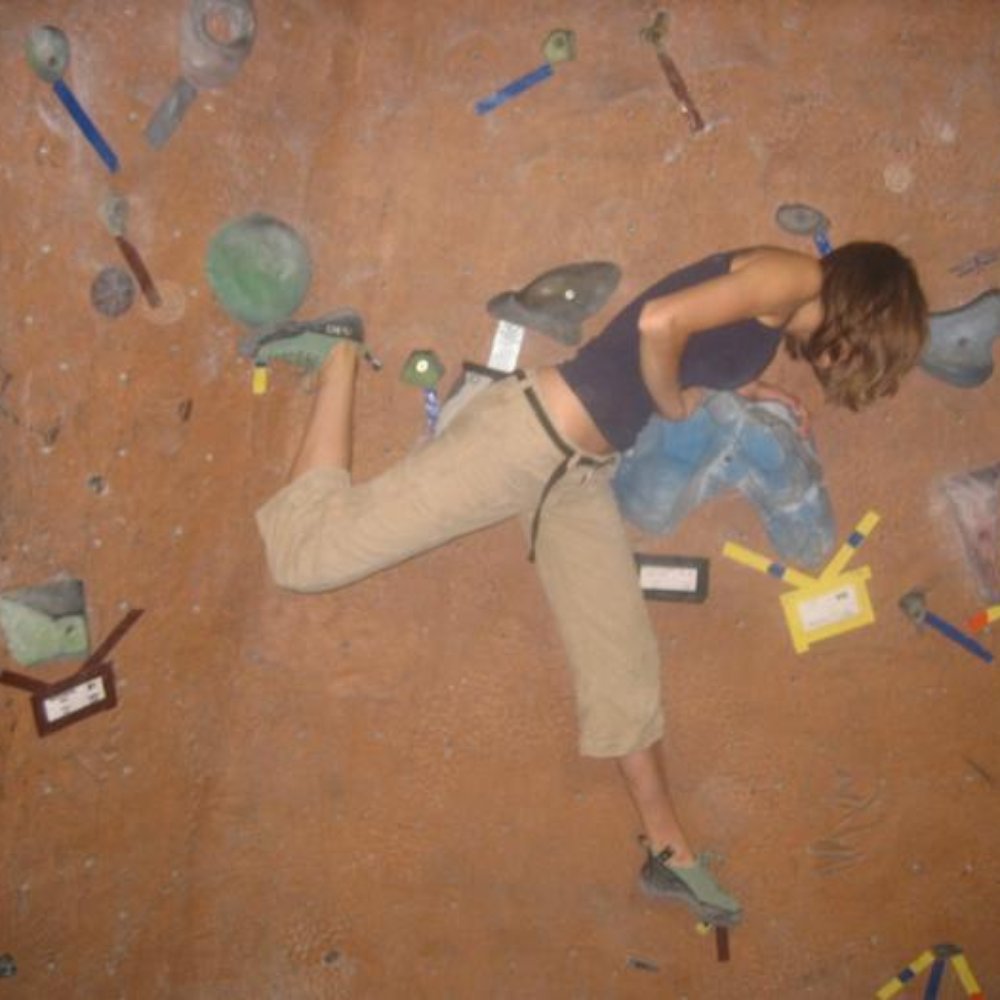 Edgeworks Climbing - Seattle - Jenny attempting a problem that we could never complete. - Climbing Near Me - Seattle, Washington Edgeworks Climbing - Seattle - Jenny attempting a problem that we could never complete. - Climbing Near Me - Seattle, Washington