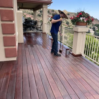 Starlight Restoration - a man cleaning a deck - Painters Near Me - Lakewood, Colorado Starlight Restoration - a man cleaning a deck - Painters Near Me - Lakewood, Colorado