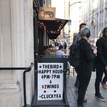 The Bird - Exterior: happy hour sign - Chicken Shop Near Me - San Francisco, California The Bird - Exterior: happy hour sign - Chicken Shop Near Me - San Francisco, California