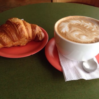 Fioza - Mocha and a croissant. Unfortunately, I couldn't recognize what the milk-foam drawing was. - Coffee & Tea Near Me - Houston, Texas Fioza - Mocha and a croissant. Unfortunately, I couldn't recognize what the milk-foam drawing was. - Coffee & Tea Near Me - Houston, Texas