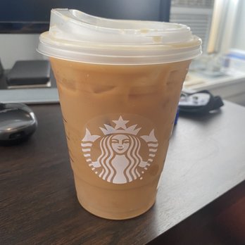 Starbucks - a cup of iced coffee on a desk - Coffee & Tea Near Me - Philadelphia, Pennsylvania