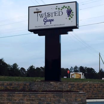 The Twisted Grape - Road front sign. - Italian Near Me - Cameron, North Carolina The Twisted Grape - Road front sign. - Italian Near Me - Cameron, North Carolina