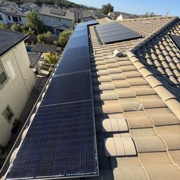 New panels by LA Solar along side existing panels.