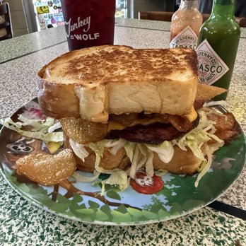 Turkey And The Wolf - their classic fried bologna sandwich with potato chips - Sandwiches Near Me - New Orleans, Louisiana Turkey And The Wolf - their classic fried bologna sandwich with potato chips - Sandwiches Near Me - New Orleans, Louisiana