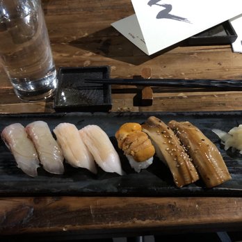 M Sushi - Left to right: Sea Bream (2 pieces), White Tuna (2 pieces), Uni (1 piece) and Anagi (2 pieces) - Sushi Bars Near Me - Durham, North Carolina M Sushi - Left to right: Sea Bream (2 pieces), White Tuna (2 pieces), Uni (1 piece) and Anagi (2 pieces) - Sushi Bars Near Me - Durham, North Carolina