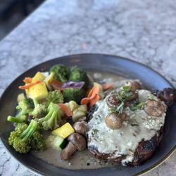 Firebirds Wood Fired Grill - 16oz Aged Ribeye with blue cheese and mushroom topping! DELICIOUSNESS!!!