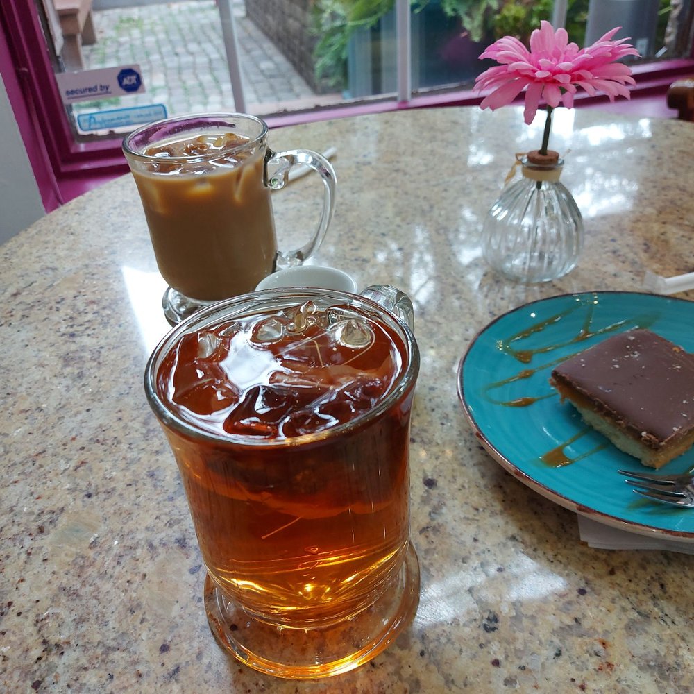 Lola's Choco Bar and Sweet House - Peach Tea. It's just bagged tea. The coffee is really good here though! Also a shortcake. - Desserts Near Me - Burlington, Ontario Lola's Choco Bar and Sweet House - Peach Tea. It's just bagged tea. The coffee is really good here though! Also a shortcake. - Desserts Near Me - Burlington, Ontario