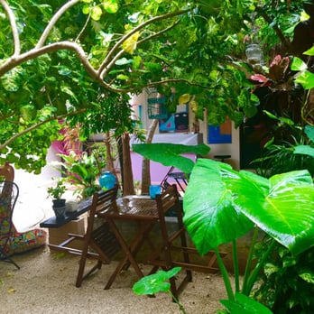 Villas Geminis - Garden area with several bistro sets. - Hotels Near Me - Tulum, ROO