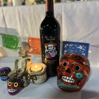 Via Vega Vineyard - a bottle of wine and skulls - Wine Tasting Room Near Me - Paso Robles, California Via Vega Vineyard - a bottle of wine and skulls - Wine Tasting Room Near Me - Paso Robles, California