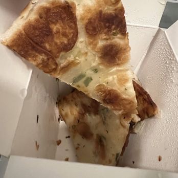 Dumpling The Noodle - Green Onion Pancake. Only 3"?? I generously didn't show the burnt side. - Noodles Near Me - Seattle, Washington