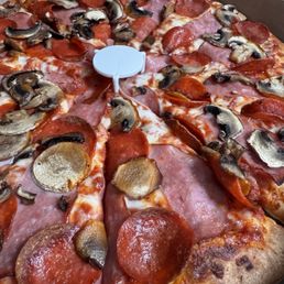 Pepperoni ham and mushroom pizza