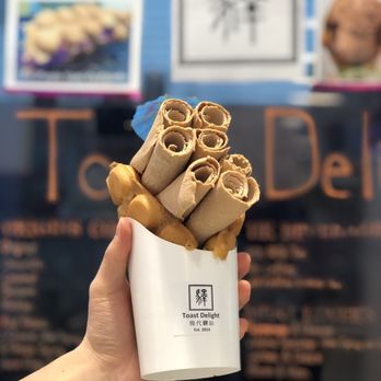 Toast Delight - Original Bubble Waffle + Hong Kong Milk Tea Rolled Ice Cream ($10.50 + tax) - Desserts Near Me - Markham, Ontario Toast Delight - Original Bubble Waffle + Hong Kong Milk Tea Rolled Ice Cream ($10.50 + tax) - Desserts Near Me - Markham, Ontario