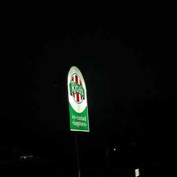 Rita’s Italian Ice & Frozen Custard - a neon sign at night - Ice Cream & Frozen Yogurt Near Me - Evesham, New Jersey Rita’s Italian Ice & Frozen Custard - a neon sign at night - Ice Cream & Frozen Yogurt Near Me - Evesham, New Jersey