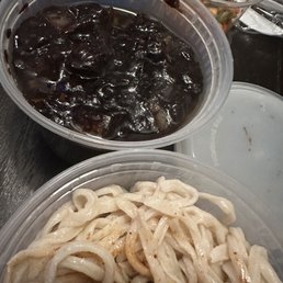 two bowls of noodles and chopsticks two bowls of noodles and chopsticks