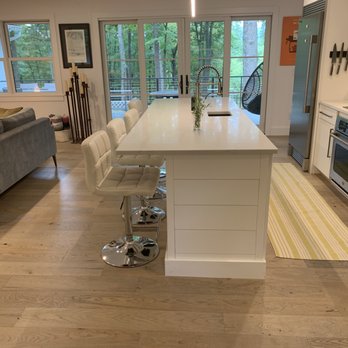 Affordable Granite & Cabinetry - long view showing shiplap (apuzzo kitchens) and flooring (BC and N) under granite - Cabinetry Near Me - Fishkill, New York