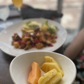 Six Nine Restaurant & Bar - Side of fruit and eggs Benedict. - Wine Bars Near Me - Frederiksted, Virgin Islands Six Nine Restaurant & Bar - Side of fruit and eggs Benedict. - Wine Bars Near Me - Frederiksted, Virgin Islands