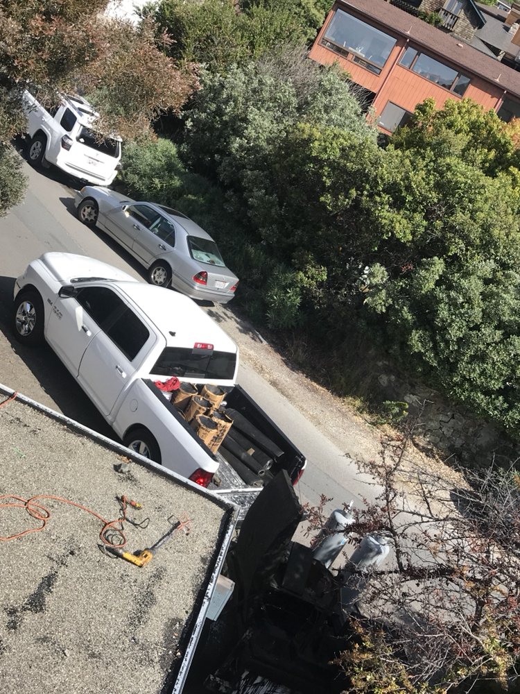 Slide of Francos Roofing