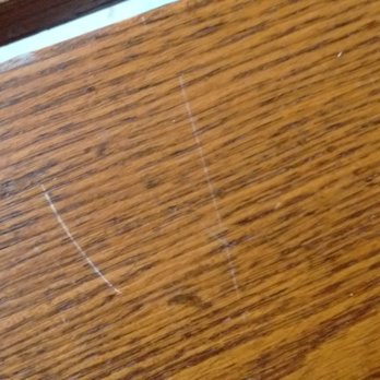 Disaster LINK Restoration Services - Damage to top of dining room table caused by DisasterLink / Pelican - Damage Restoration Near Me - Glendale, Arizona
