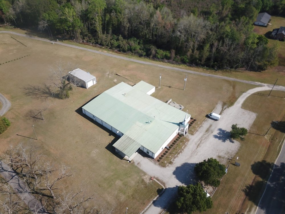 Slide of LandShark Roofing