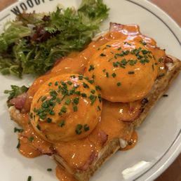 Peck Special - chorizo waffle with bacon and peck sauce is like slightly spicy hollandaise.