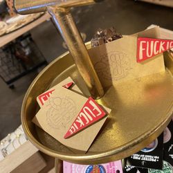 Odd One Out - "HATE" pins showing disrespect to ICE and police in general, IMO.