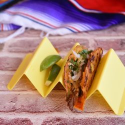 Yummy Tacos - Crispy beef birria taco packed with flavor and served with fresh lime. A local favorite at Yummy Tacos in Williston Park, NY.