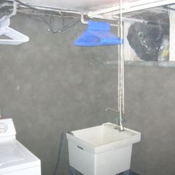 J & M Concrete & Waterproofing - Interior basement wall parge coating