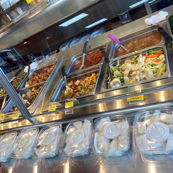 New Kim Lee Fast Food - Chinese stir fried entrees in rear. Vietnamese pastry in front. - Fast Food Near Me - Milpitas, California New Kim Lee Fast Food - Chinese stir fried entrees in rear. Vietnamese pastry in front. - Fast Food Near Me - Milpitas, California