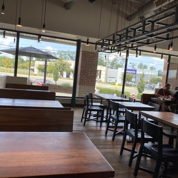 CAVA - interior seating - Mediterranean Near Me - Washington Center Fairfax, Virginia CAVA - interior seating - Mediterranean Near Me - Washington Center Fairfax, Virginia